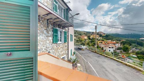 a view of a street from a balcony of a house at Ca' dell'aia - By Ligooria in Magliolo