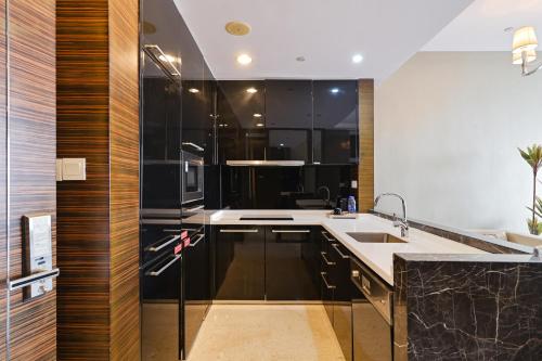 Kuchyň nebo kuchyňský kout v ubytování Snug Gaokong Jiangjing Hotel