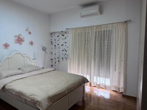 Postel nebo postele na pokoji v ubytování Piraeus new hotel