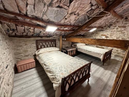 Ένα ή περισσότερα κρεβάτια σε δωμάτιο στο Casa Curillas