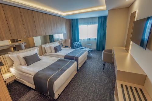 Letto o letti in una camera di FT Lotus Thermal Hotel&SPA Trademark Collection by Wyndham
