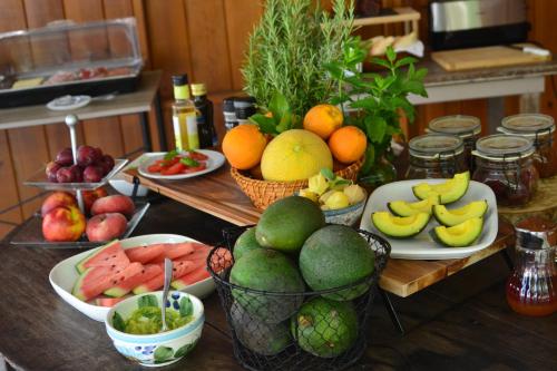 a table topped with lots of fruits and vegetables at Quinta da Norinha in Portimão