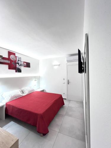 Postel nebo postele na pokoji v ubytování Longevity Hotel