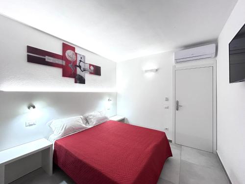 Postel nebo postele na pokoji v ubytování Longevity Hotel