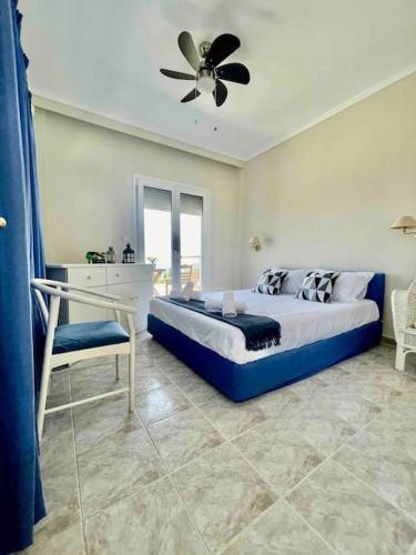 Ένα ή περισσότερα κρεβάτια σε δωμάτιο στο CalDi Sea View House