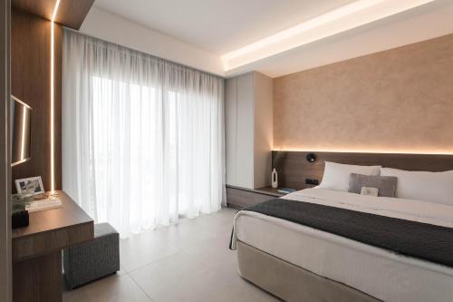 Katil atau katil-katil dalam bilik di Chania Elegance Suites