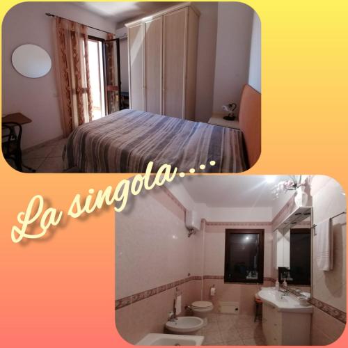 a bedroom with a bed and a bathroom with a sink at B&B Ida in Oristano