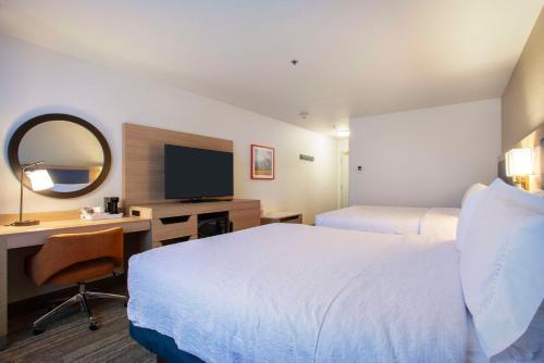 Ένα ή περισσότερα κρεβάτια σε δωμάτιο στο Hampton Inn & Suites Mountain Home