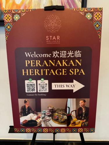 a sign for a pendarvanian heritage spa in a restaurant at Star Residence Suite KLCC in Kuala Lumpur
