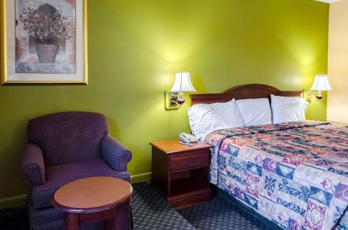 Ένα ή περισσότερα κρεβάτια σε δωμάτιο στο Rodeway Inn Vicksburg