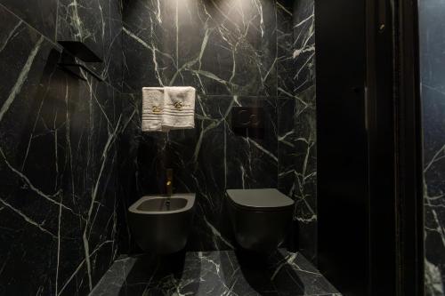 Ein Badezimmer in der Unterkunft Suite 26 Rimini