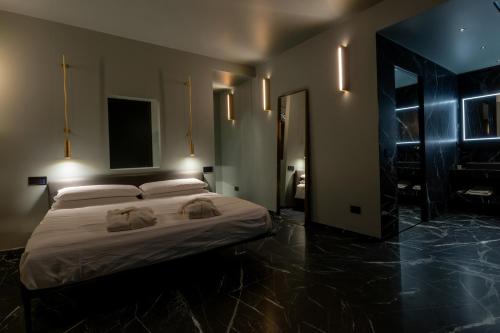 Ein Bett oder Betten in einem Zimmer der Unterkunft Suite 26 Rimini
