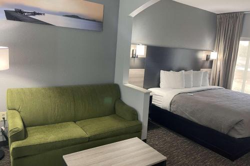 Ένα ή περισσότερα κρεβάτια σε δωμάτιο στο Quality Suites Abilene Mall Area
