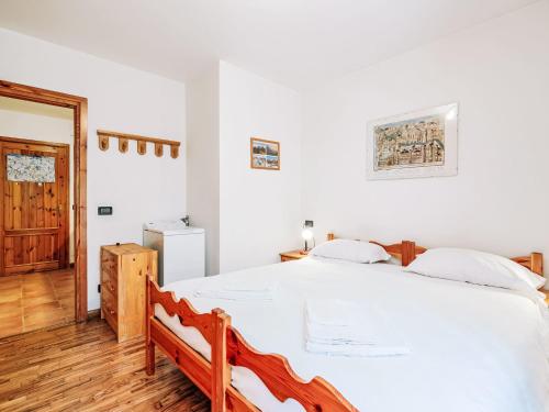 Apartment Condominio Val di Fassa-2 by Interhomeにあるベッド