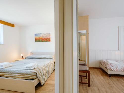 Apartment Casa Polla-1 by Interhomeにあるベッド