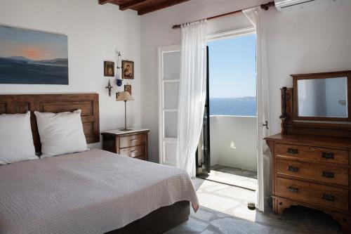 Posteľ alebo postele v izbe v ubytovaní Two Houses Lighthouse Villa