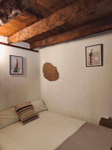 Katil atau katil-katil dalam bilik di Tulia Guesthouse & Coworking