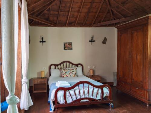 Katil atau katil-katil dalam bilik di Tulia Guesthouse & Coworking