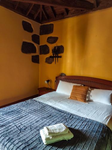 Katil atau katil-katil dalam bilik di Tulia Guesthouse & Coworking