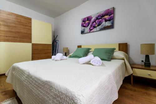Кровать или кровати в номере Pretty apartment in the centre - Old Town Zadar