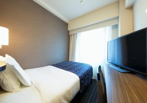TV a/nebo společenská místnost v ubytování APA Hotel Sakai Ekimae