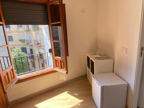 TV a/nebo společenská místnost v ubytování La Escalerita