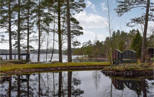 a view of a body of water with trees at Nice Home In Nol With House Sea View in Nol
