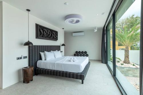 Ένα ή περισσότερα κρεβάτια σε δωμάτιο στο Villa Sea View Luxury