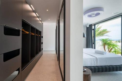 Ένα ή περισσότερα κρεβάτια σε δωμάτιο στο Villa Sea View Luxury