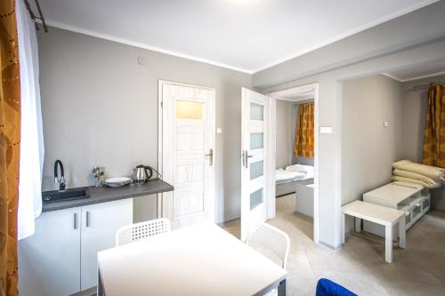 Katil atau katil-katil dalam bilik di Przystań Lubniewice