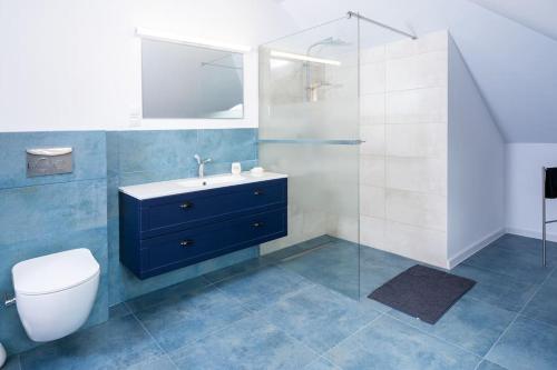 Et badeværelse på Golf & Lake House 14