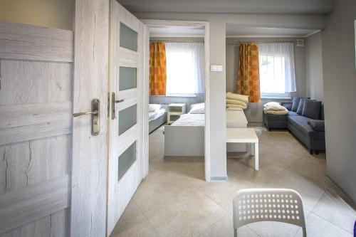 Katil atau katil-katil dalam bilik di Przystań Lubniewice