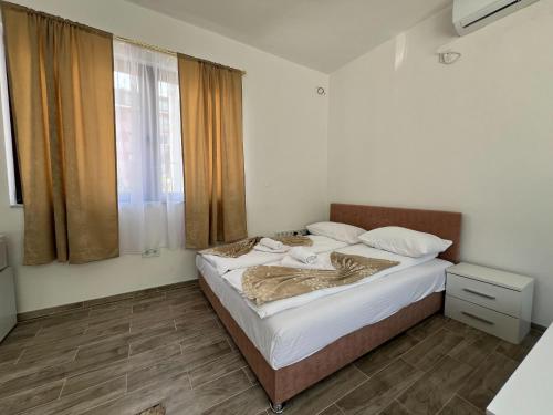 Ένα ή περισσότερα κρεβάτια σε δωμάτιο στο Bella Heart of Old Town