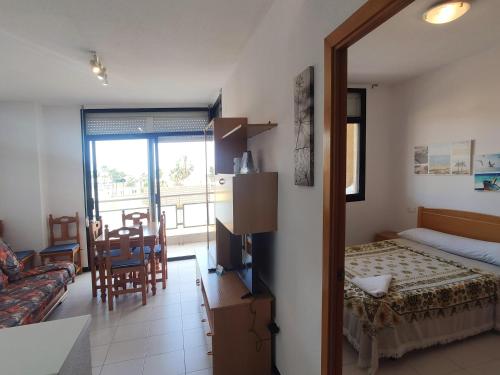 Posteľ alebo postele v izbe v ubytovaní Apartamentos Surfing 3000