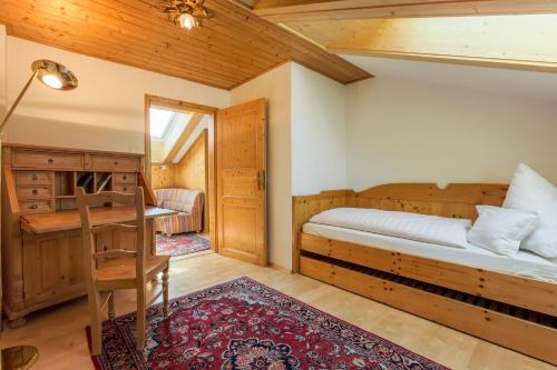 Säng eller sängar i ett rum på Hotel Brunner