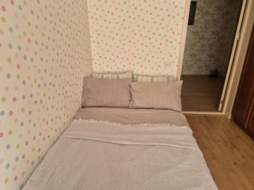 Postel nebo postele na pokoji v ubytování spatios si linistit