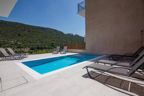 Πισίνα στο ή κοντά στο Villa Elpida at Minies