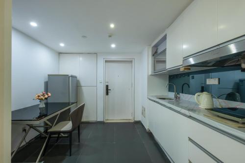 Η κουζίνα ή μικρή κουζίνα στο Mihua Times You Apartment