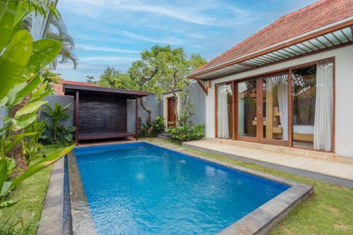 Πισίνα στο ή κοντά στο Kings Villas Sanur by Moria