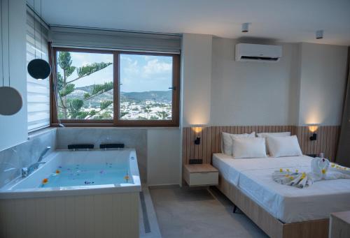 Ένα ή περισσότερα κρεβάτια σε δωμάτιο στο Zera Bodrum By Özükara