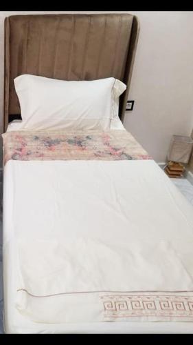 Postel nebo postele na pokoji v ubytování Le Royal un appartement Luxueux