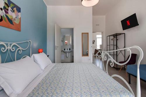 Postel nebo postele na pokoji v ubytování Casa Fiorita Apartment & Free Parking - Lecce Selection