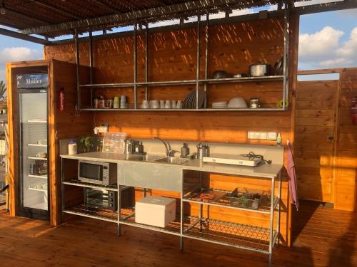 a kitchen with a sink and a counter top at The Turquoise Suite on the Sea Trail, Atlit in Atlit