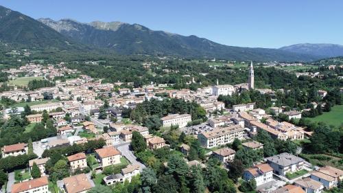an aerial view of a town in the mountains at B&B da Monsignore in Crespano del Grappa