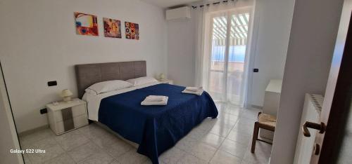 Ένα ή περισσότερα κρεβάτια σε δωμάτιο στο Spacious Apartment in Amalfi - 100 sqm - Parking included