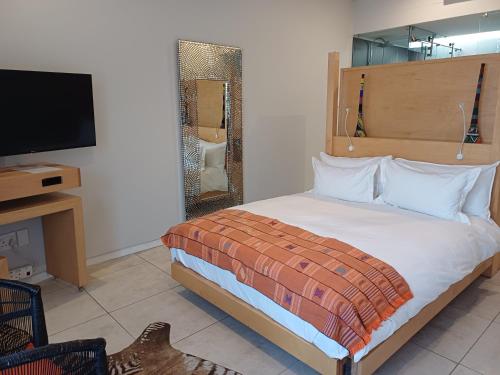 Ένα ή περισσότερα κρεβάτια σε δωμάτιο στο Alpine Attitude Boutique Hotel & Conference Venue