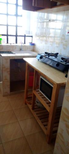 Η κουζίνα ή μικρή κουζίνα στο Cosyhomes