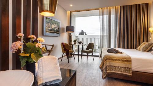 Katil atau katil-katil dalam bilik di Évora O Cante Hotel