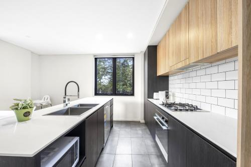 Η κουζίνα ή μικρή κουζίνα στο Lovely apartment in Manly Vale