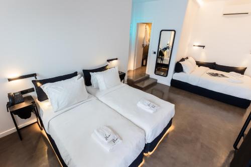 Katil atau katil-katil dalam bilik di She Mykonos - The Residency